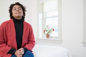 woman breathing on bed