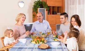 happy family at dinner table