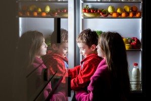 kids looking into the fridge