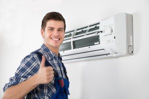 air conditioner repairman giving thumbs up