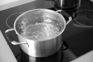 boiling water on a stove