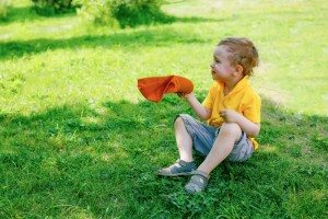 kid cooling off outside