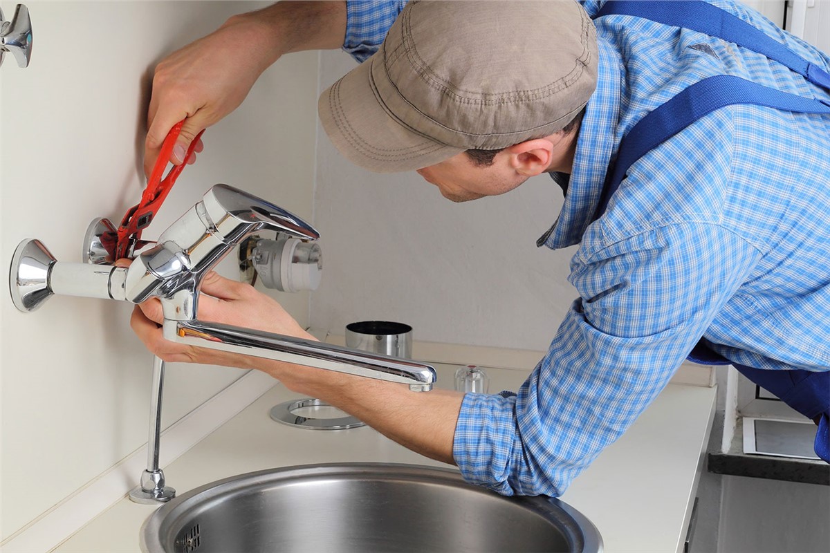 repairing kitchen sink plumbing